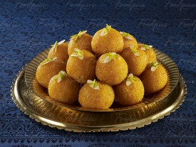 Motichoor Ladoo Fried, sweet batter drops garnished with pistachios preview
