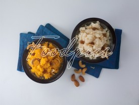 Sheera Two bowls of sweet semolina pudding image preview